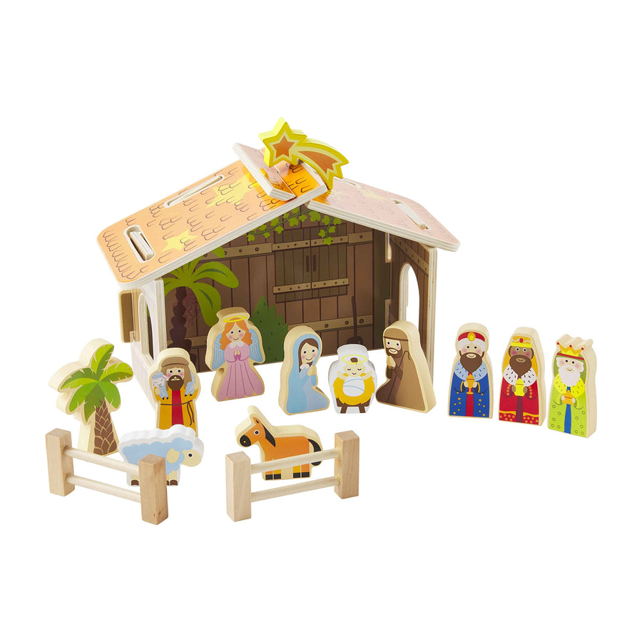 Wooden nativity set with figures and stable on a white background