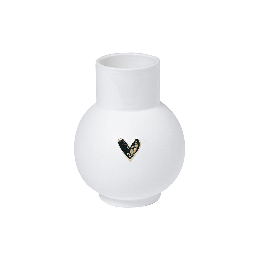 White vase with a black and gold heart design on a white background