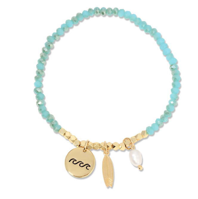 Bracelet with turquoise beads and gold charms on a white background