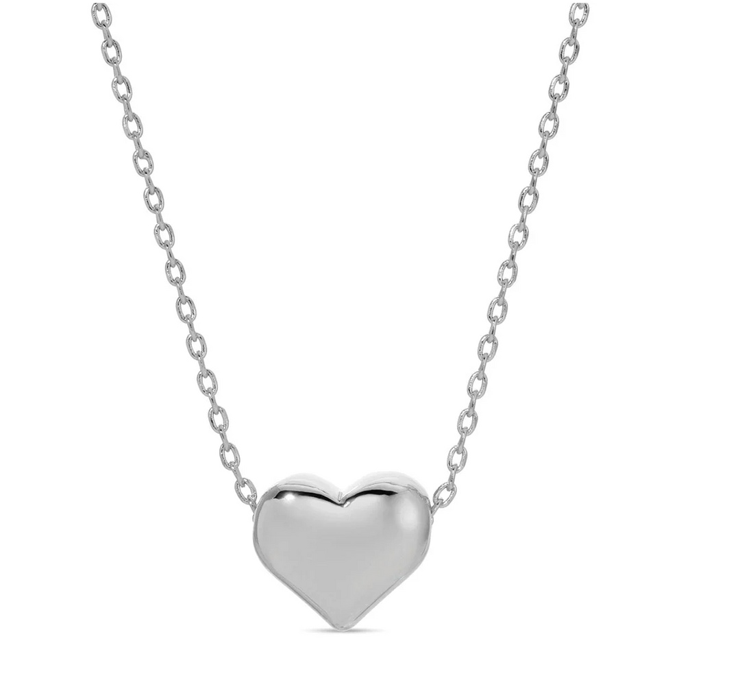 Silver heart-shaped pendant on a chain against a white background