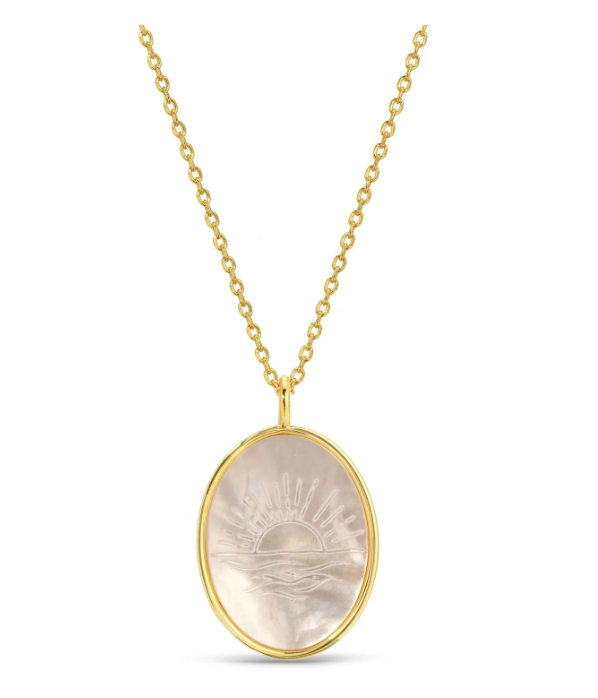 Gold necklace with an oval pendant on a white background
