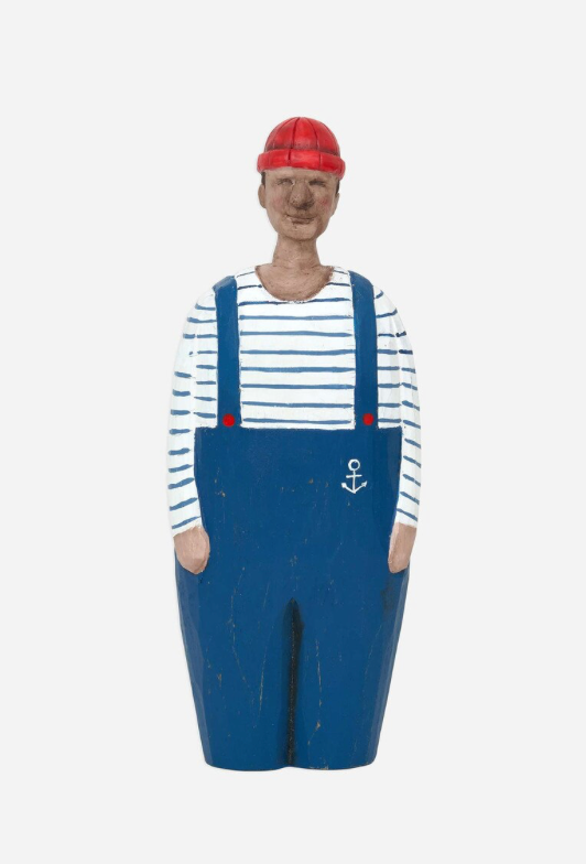 Person wearing a striped shirt and blue overalls with a red cap on a white background
