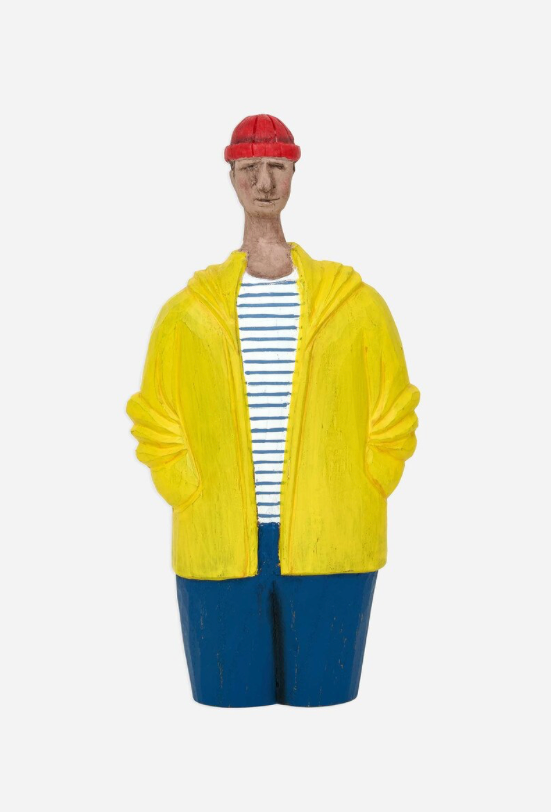 Mannequin wearing a yellow raincoat, striped shirt, and blue pants on a white background